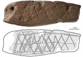 Figure 1: Linear symbols engraved into a block of Ochre at Blombos Cave (from Henshilwood et al. 2006, 35).