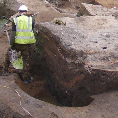 Figure 2. Distinctive early to mid' 10th century 'tiger stripes' slumping into an earlier cess pit