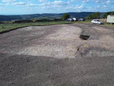 Figure 1 - Trench AD showing levelled rampart and barrow, along with enclosure entrance and ditch. (Image Copyright Rawlins-Welburn)