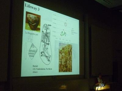 Figure 3 - Dr. Penny Bickle (Cardiff) presenting her and Prof. Alisdair Whittle's paper on differing scales of LBK lifeways (Image Copyright: D. Altoft; kind permission of P. Bickle)