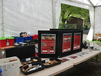 Figure 2: Finds, historical prints and information boards on display in on-site marquee (Image Copyright: Emily Rayner)