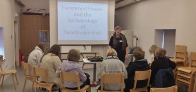 Figure 4: Author giving a talk to members of the Harewood House Trust with finds (Image Copyright: Emily Rayner)