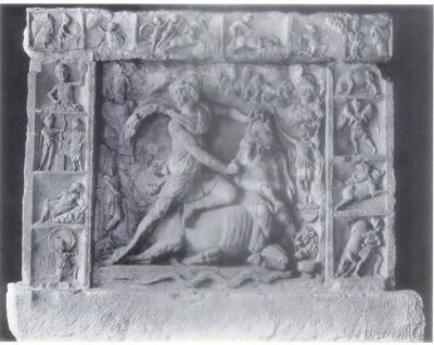 Figure 21. (Top Right) Neuenheim, Mithras shooting arrow at the rock, second top panel from the left. Vermaseren, M.J. 1956, CIMRM 1283.